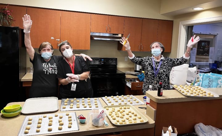 Mary Gessler OT baking session with residents of Morningside Place Memory Care