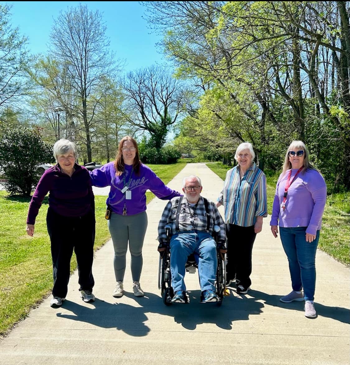 Residents from Clear Creek walking in the park.