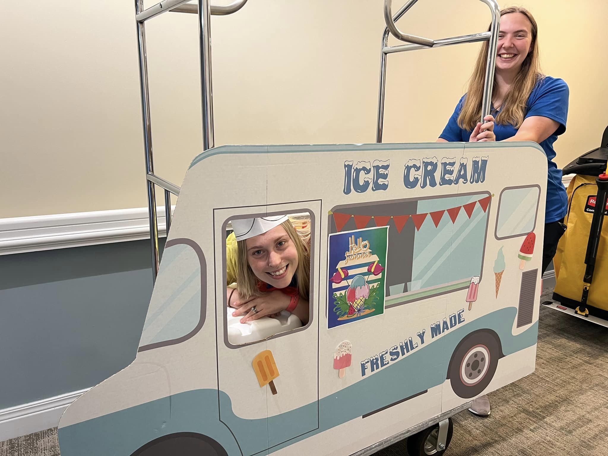 ice cream truck delivering ice to residents