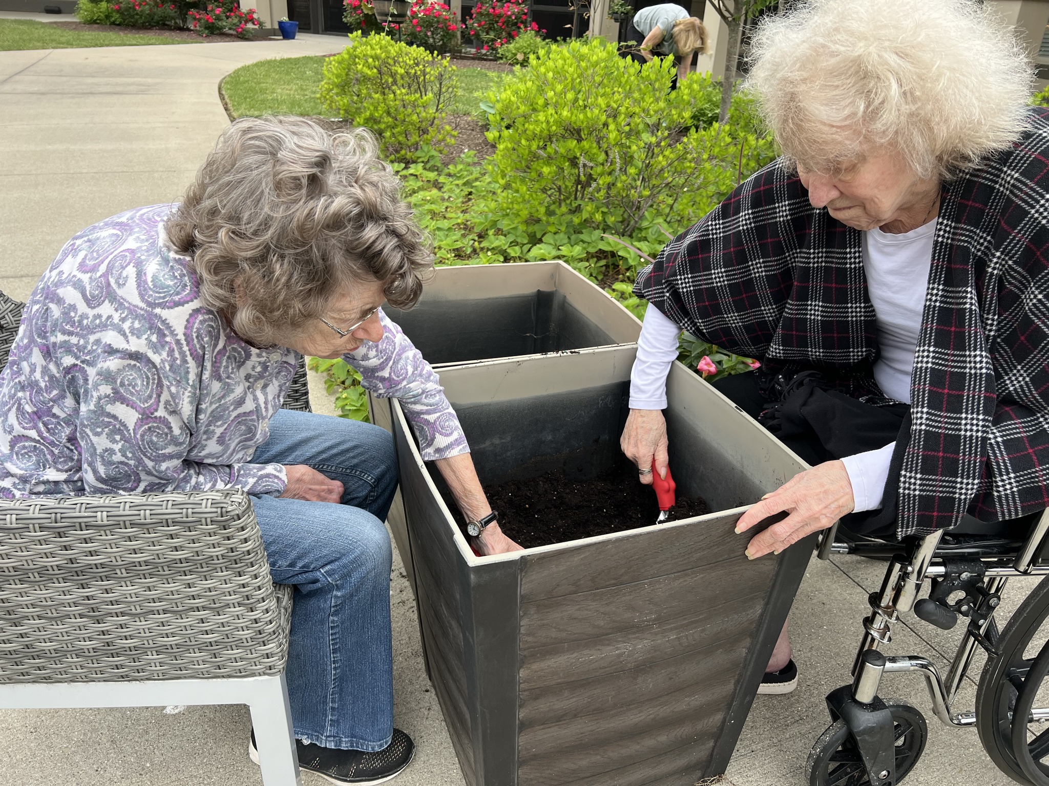 two residents gardening